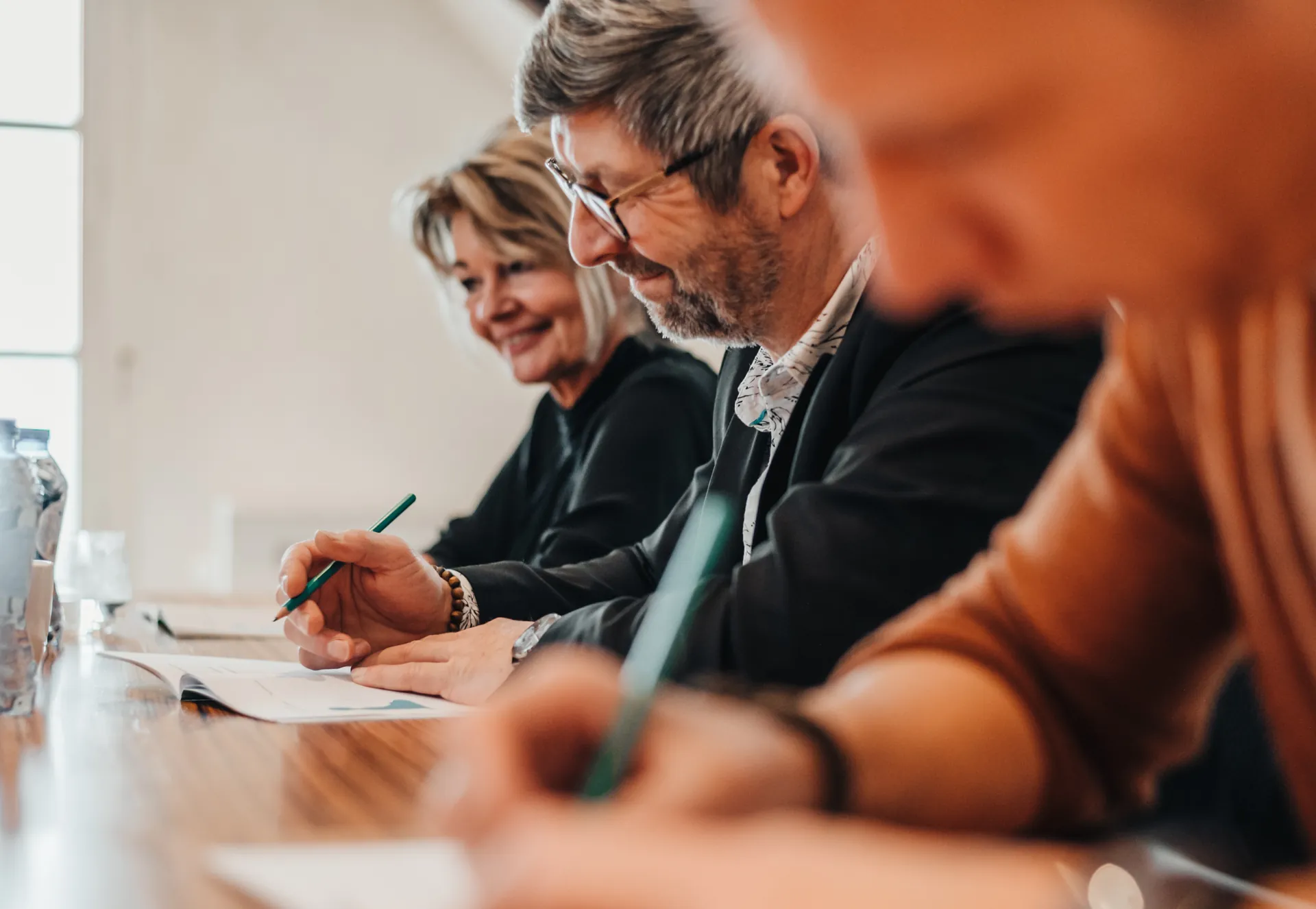 Deelnemer maakt aantekeningen tijdens een sessie van The Lab of Life